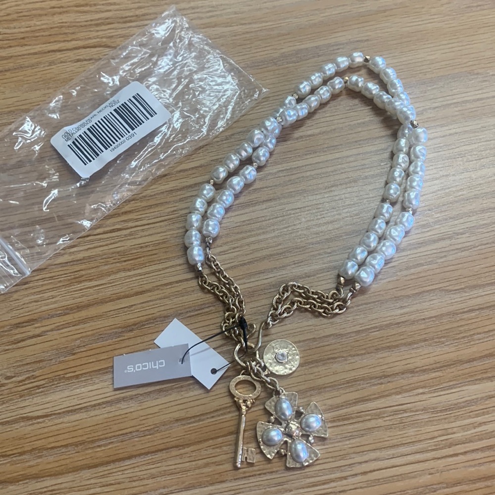 Chico’s faux pearl necklace with charms. NWT